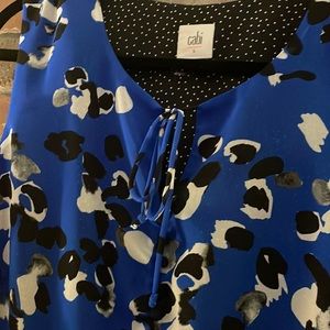 Turn Their Heads in this sassy yet sophisticated Cabi asymmetrical dress!